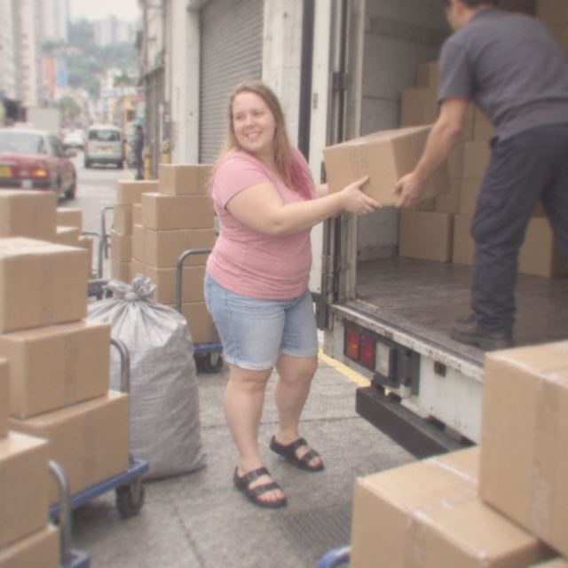 Jen loading holiday orders onto a delivery truck