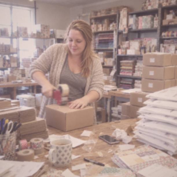 Jen packing holiday orders at the craft store